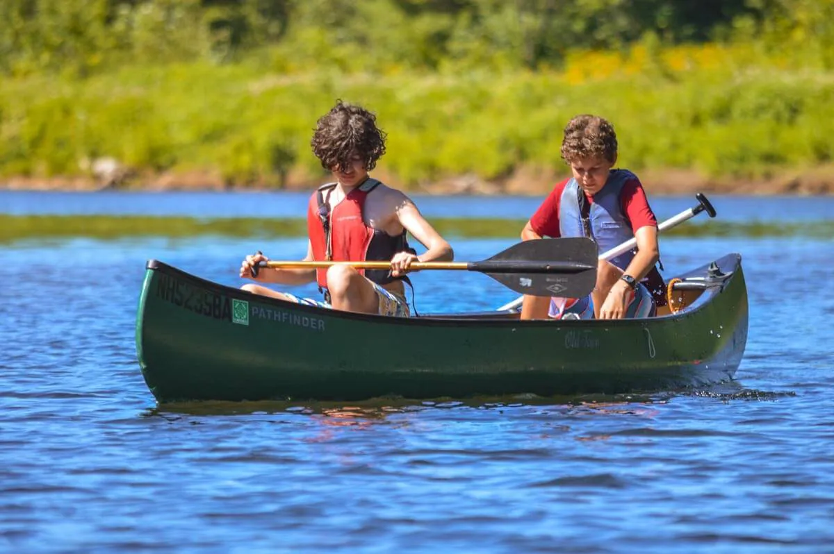 Boys canoeing on Lake Winnipesaukee