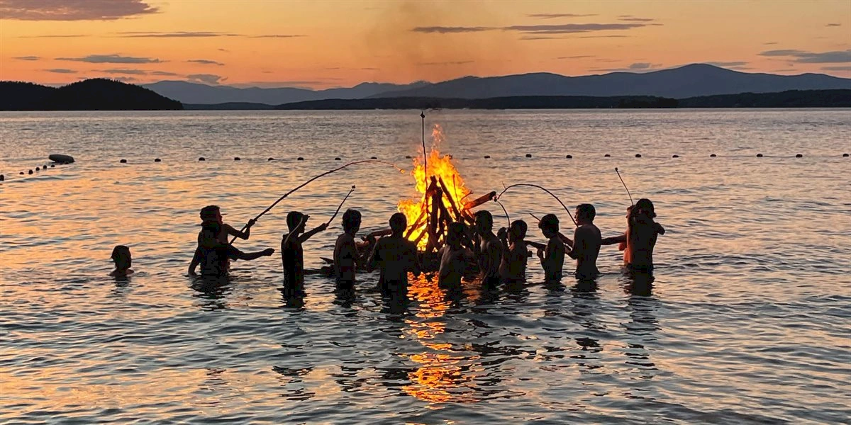 Boys around bonfire