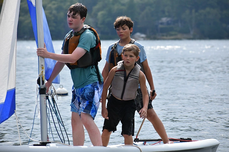 Boys sailing on Lake Winnipesaukee