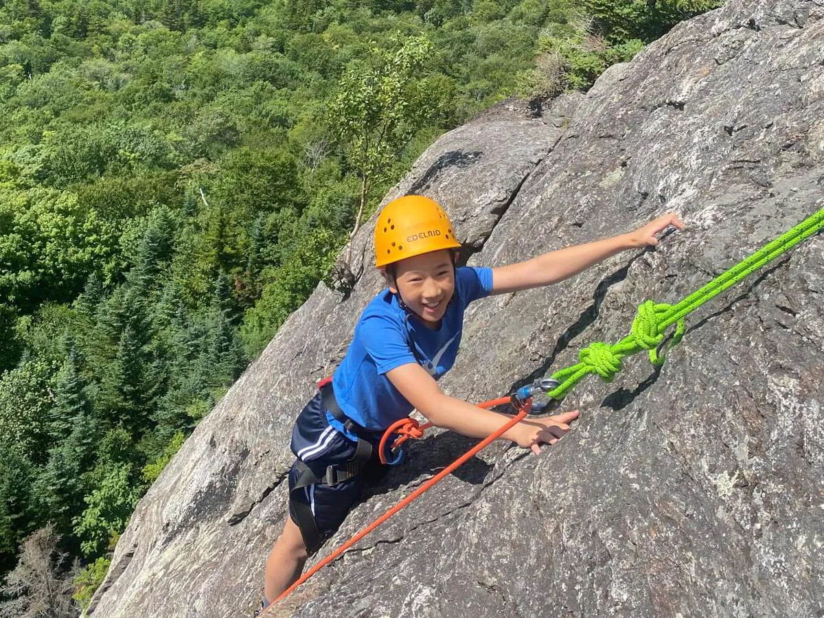 Boy rock climbing 